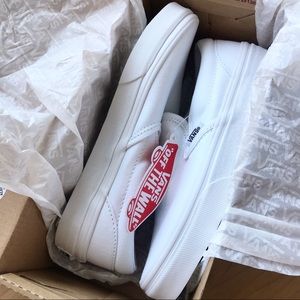 Vans white slip ons